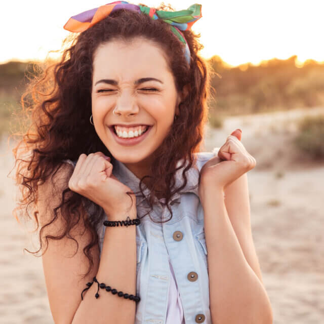 Woman smiling in the sunshine